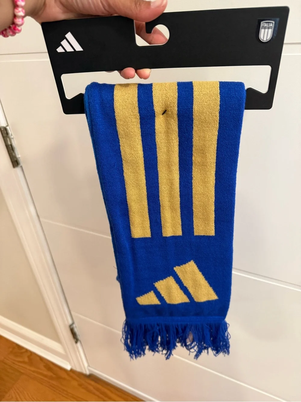 This is an Adidas Italy 26 scarf in Bold Blue and Hazy Beige